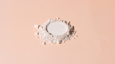 Light Beige Powder with Round Mark Under Revolving Light