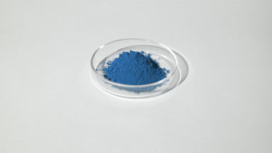 Vertical Orbit of Blue Powder in Glass Dish