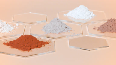 Beige and Brown Clay Heaps on Hexagonal Glass