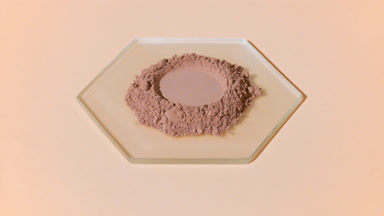 Beige and Brown Fine Powder on Hexagonal Glass