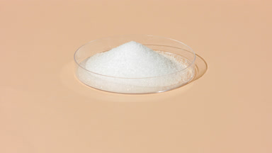 Crane View of White Powder in Petri Dish on Beige