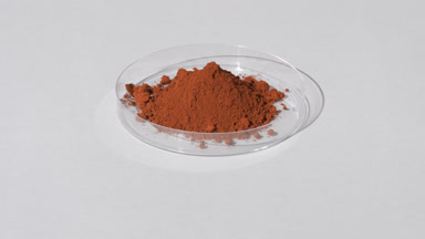 Brown Fine Powder in Petri Dish with Dynamic Lighting