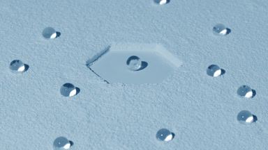Pale Blue Powder Surface with Hexagonal Imprint and Shadows