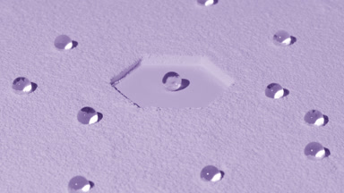 Wide Shot of Violet Powder Surface with Shifting Shadows