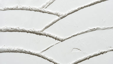 Shifting Shadows on White Powder Surface