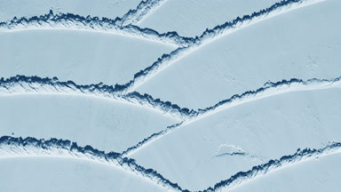 Dynamic Shadows on Pale Blue Powder Surface