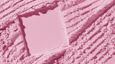 Pale Pink Powder Surface with Evolving Shadows and Furrows