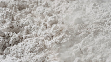 High-Magnification Slow-Motion White Powder Dispersion