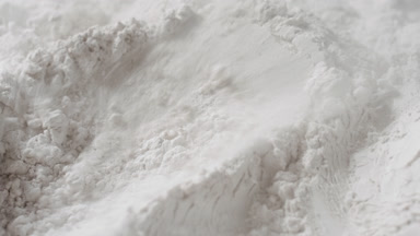 White Mica Powder Blown by Air in Macro Slow Motion