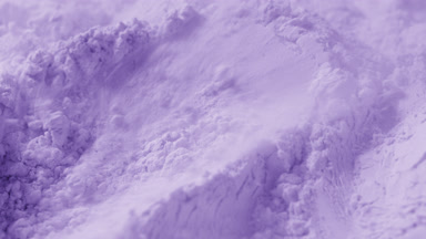 Violet Powder Surface Blown by Air in Extreme Macro