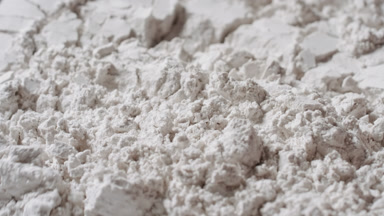 White Powder Surface Disturbance in Ultra-Detailed Macro