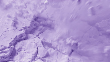 Extreme Close-Up of Violet Powder Surface in Slow Motion
