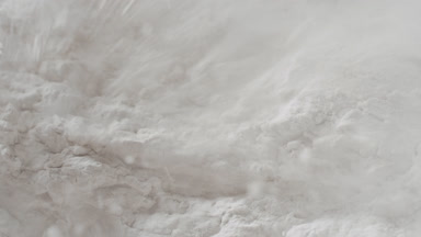 Ultra-Detailed Macro of Disrupted White Powder Surface