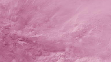 Macro Slow-Motion of Chipped Pink Powder Surface