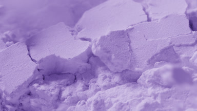 Extreme Close-Up of Violet Powder in Slow Motion