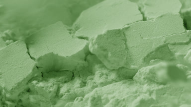 Macro Slow-Motion of Fractured Pale Green Powder