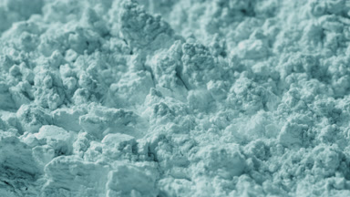 Intimate Macro of Chaotic Pale Cyan Powder
