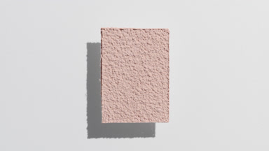 Beige Powder Sifting for Foundation Ad on Grey Background
