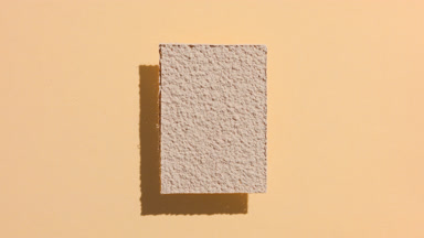 Beige Powder Rectangle on Transparent Surface with Shadow