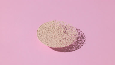 Beige Powder Circle with Dynamic Shadows for Foundation Ad