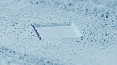 Pale Blue Powder Surface with Square Imprint and Dynamic Light