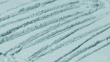 Vivid Shifting Shadows on Pale Cyan Powder with Knife Trails