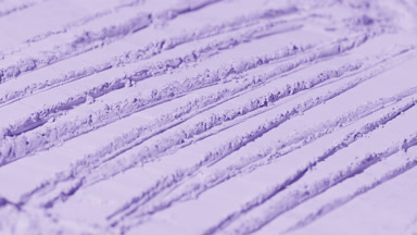 Dynamic Shadows on Violet Powder with Structured Knife Trails