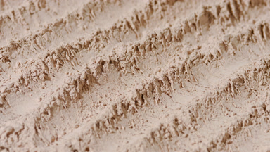 Beige Powder Furrows with Ever-Changing Shadows