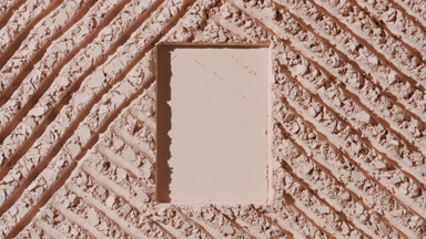 Beige Powder Surface with Rectangular Depression and Shadows