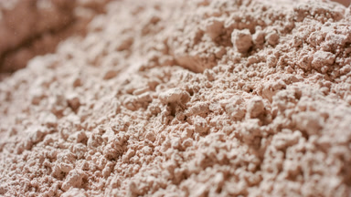 Macro of Cascading Beige Powder - Finishing Powder Concept