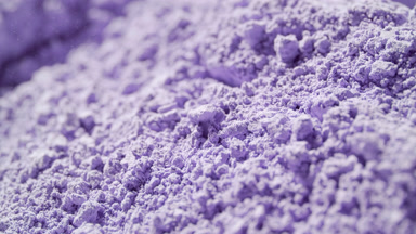 Violet Powder Cascading in Macro Slow Motion