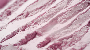 Close-Up of Air Stream Revealing Ridges in Pink Powder