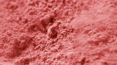 Detailed Slow Motion of Air Blown Red Powder for Blush