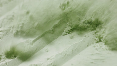 Pale Green Powder Layer Revealed in Macro Slow Motion