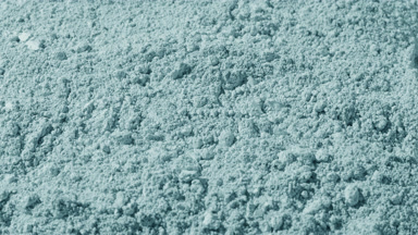 Pale Cyan Powder Surface in Directional Light Shot