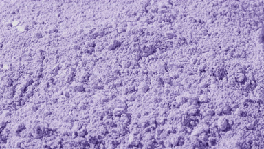 Violet Powder Surface in Vertical Arc Shot