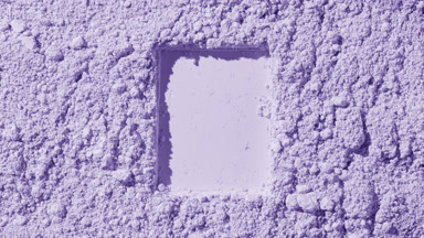 Violet Powder Surface with Distinct Mark in Top Perspective