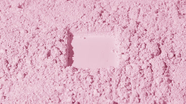 Rose Colored Powder Surface in Vertical Arc Shot for Blush
