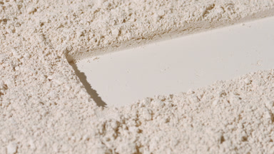 Dynamic Shadows on Beige Natural Powder Surface