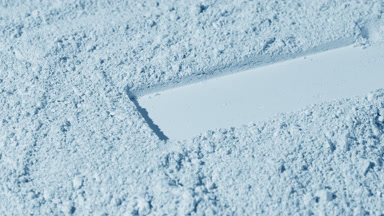 Pale Blue Powder Surface with Rectangular Mark and Shadows