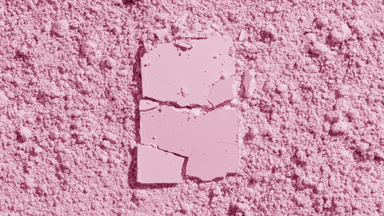Cracked Powder on Pastel Pink Surface with Evolving Shadows
