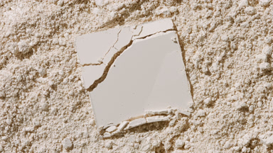 Cracked Square Powder on Beige Surface for Commercial