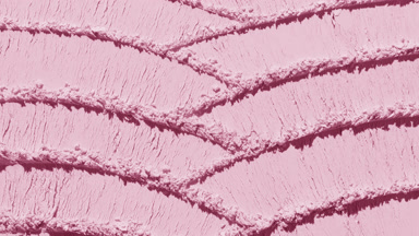 Rose Colored Powder Surface with Knife Trails and Light Effects