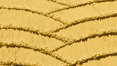 Yellow Powder Surface with Crossed Knife Marks and Shadows