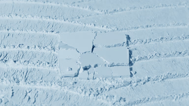 Pale Blue Powder Surface with Overlapping Knife Trails and Light