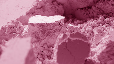 Detailed Slow Motion of Pastel Pink Powder Surface