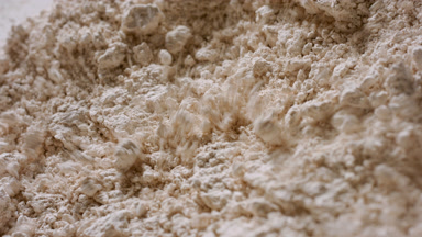 Slow Motion Close-Up of Beige Powder for Matte Campaign