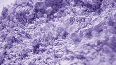 Violet Powder Surface Affected by Airflow in Slow Motion