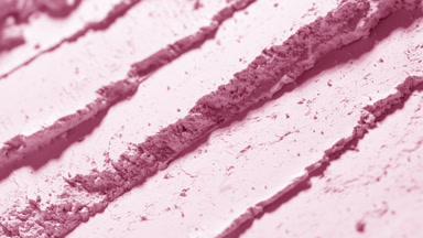 Slow-Motion Close-Up of Rose-Colored Loose Powder