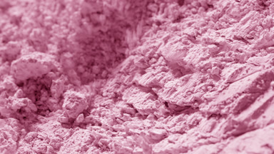 Tight Slow Motion of Pastel Pink Powder Surface